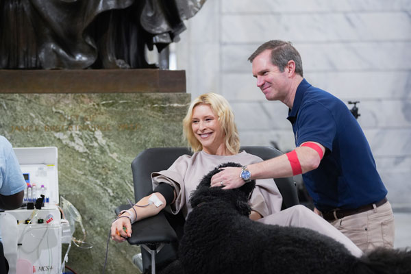 First Lady Britainy Beshear gives blood at Team Kentucky Saves Lives blood drive.